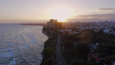 aerial drone panoramic view of malecon promenade at sunset, santo domingo