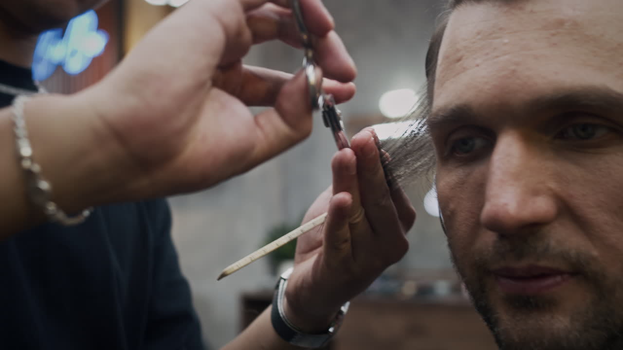 Man getting a haircut at the barber