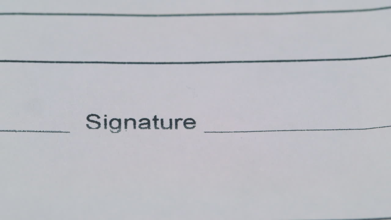 firma en un primer plano del documento