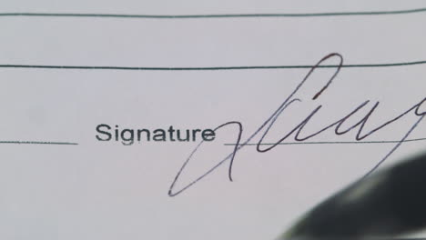 signature on a document close-up