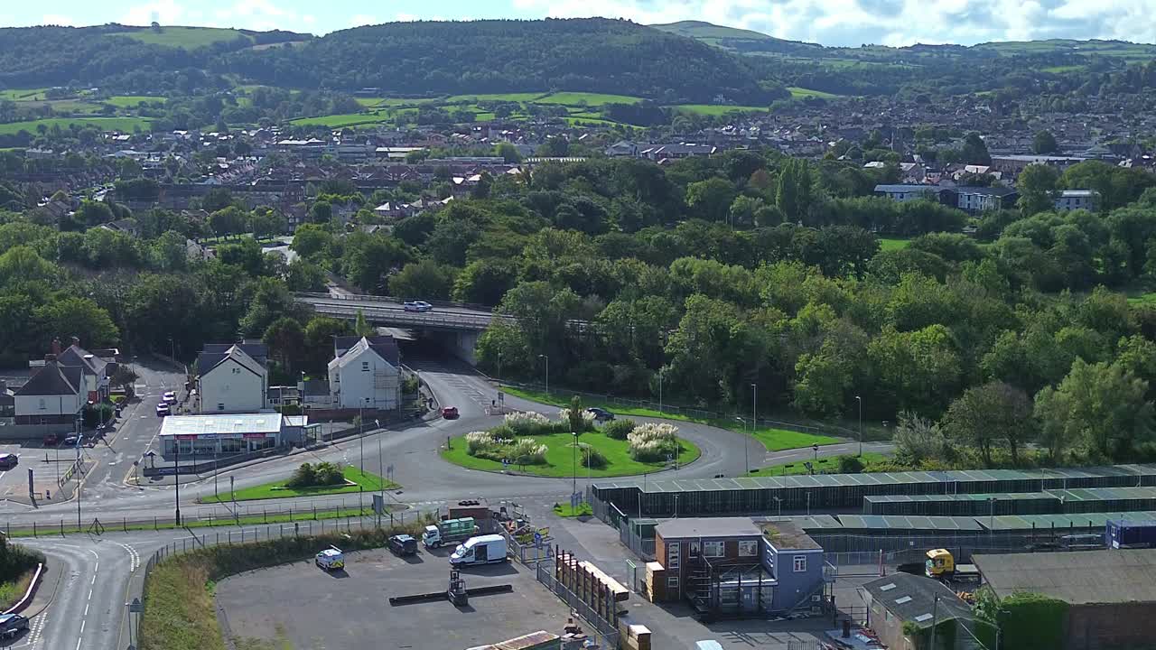 Aerial view over A55 motorway running through Abergele town Welsh mountain landscape