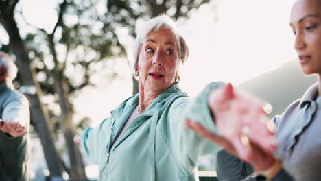 senior woman exercising with instructor