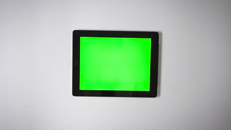 Flat-Lay-Tablet-Green-Screen-Finger-Moving-Top-Right-