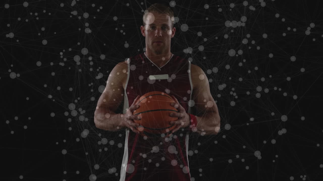 Basketball player holding ball with network of connections animation over background