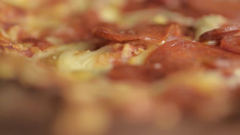 pepperoni pizza with mozzarella cheese rotating macro shot