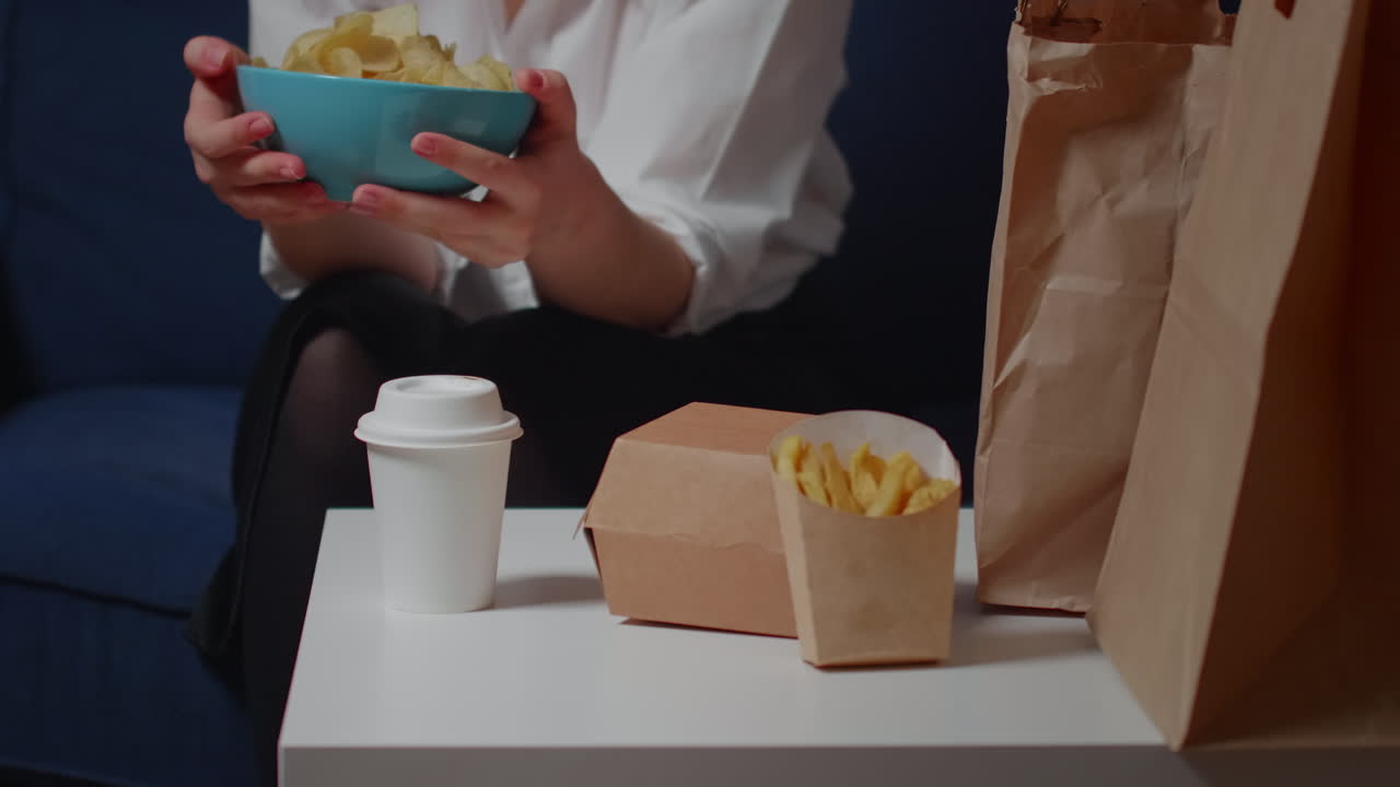 Close up of white table with fast food takeaway meal
