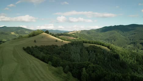 Aerial-reveal-shot-of-the-hills-around-the-water-dam-Starina-in-eastern-Slovakia