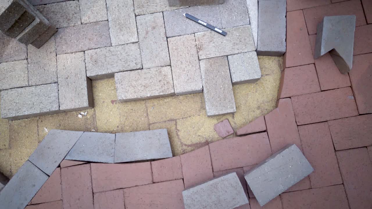 Laying Bricks for Paving Project