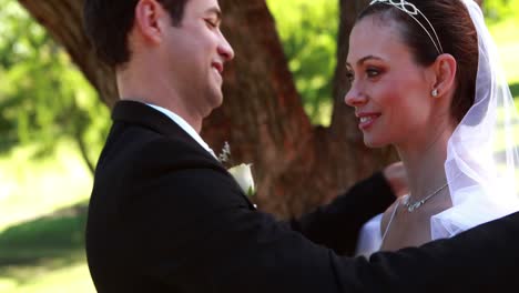 Groom-lifting-his-brides-veil-and-kissing-her