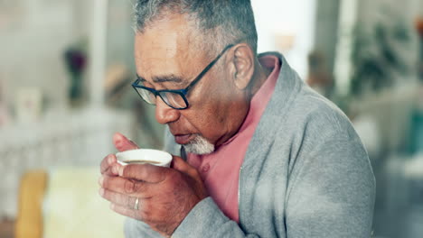 Senior-man,-home-and-coffee