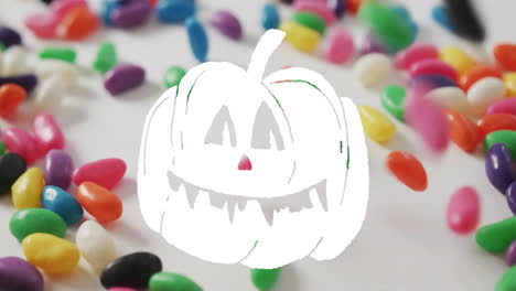 jack-o''-lantern animation over colorful jelly beans scattered on white background