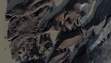 aerial shot directly downwards of a melting glacier