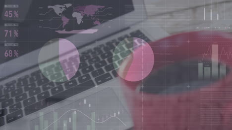 animation of graphs and charts processing data over laptop and coffee cup on desk