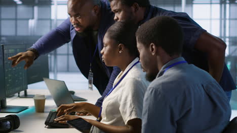 diverse team working in a modern tech facility