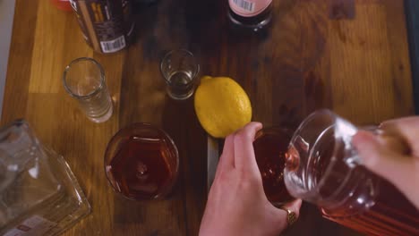 Hands make a mixed drink