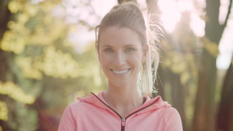 handheld video shows of smiling young woman after hard workout