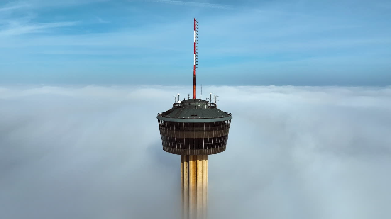 Aerial view away from the Tower of the Americas, misty sunrise in San Antonio