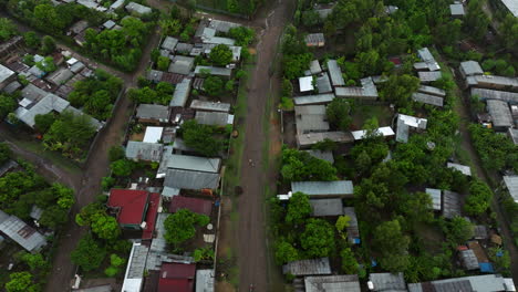 flying over homes and roads in jinka town, ethiopia
