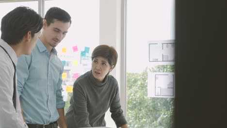 team of creative architects working together in a architect studio