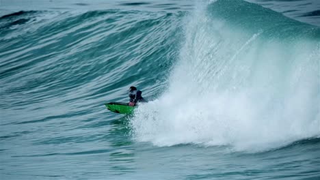 body boarder surfing a wave