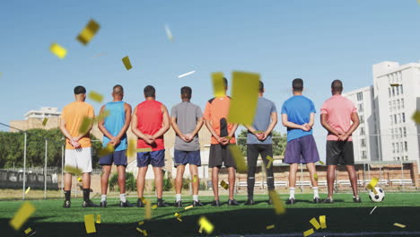 animation of confetti falling over back view of male football team on pitch