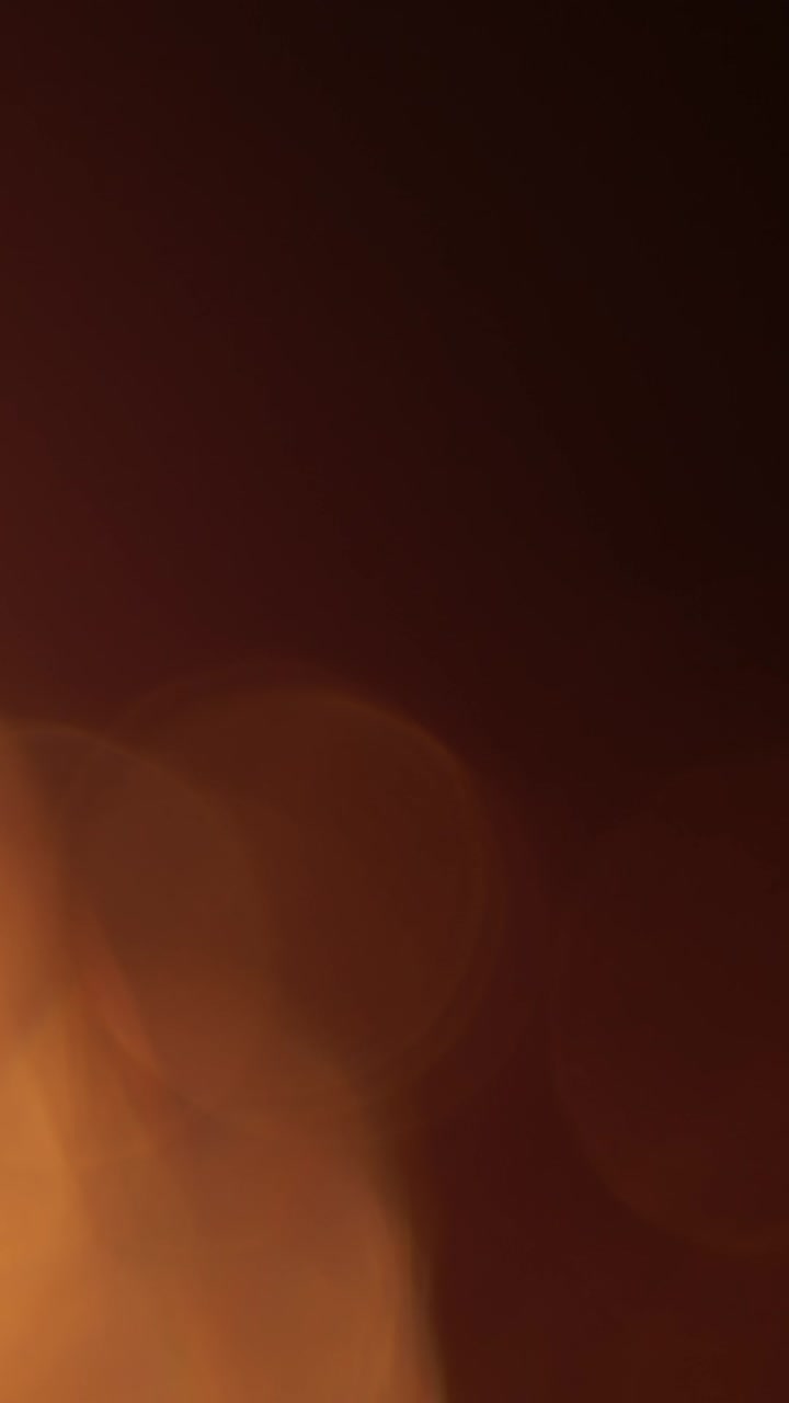 Effetto Luce Bokeh Dinamico Arancione Caldo