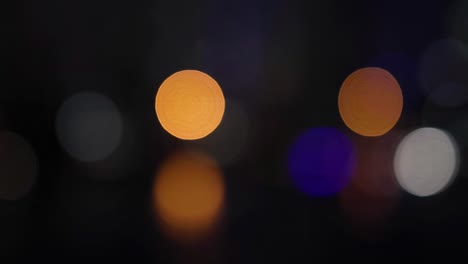 a captivating display of blurred orange and blue lights creating a serene bokeh effect.