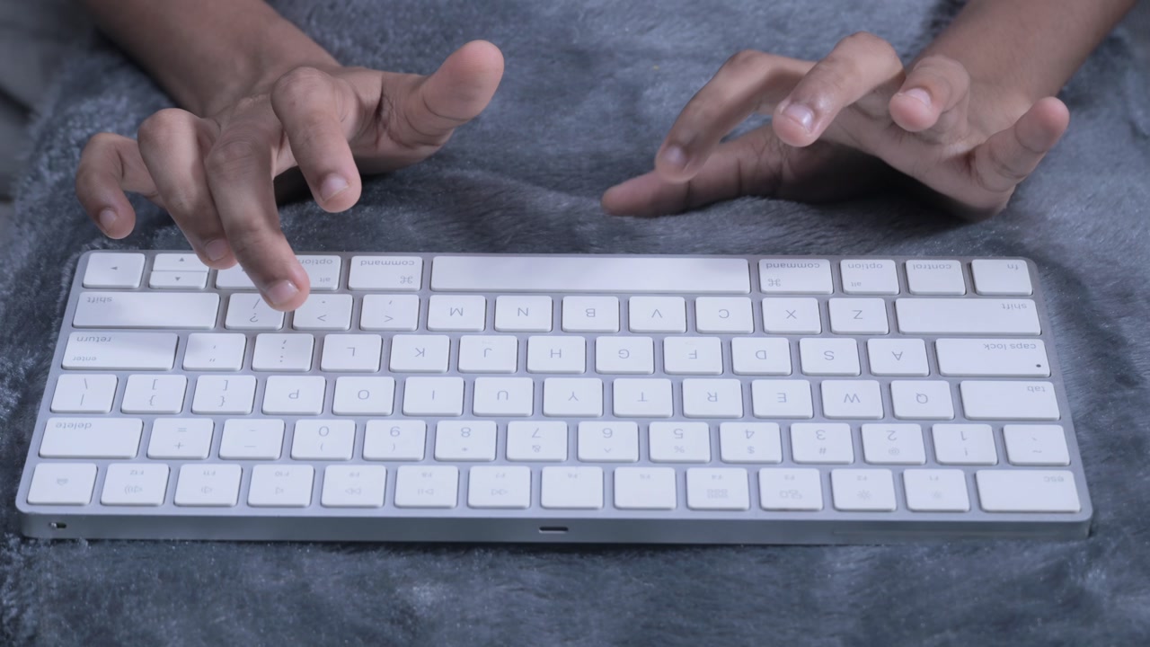 girl typing i love you in closeup view