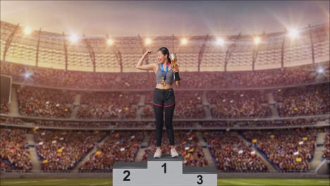 woman celebrating victory on podium