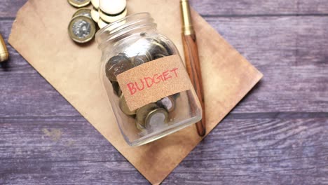 budget saving jar with coins