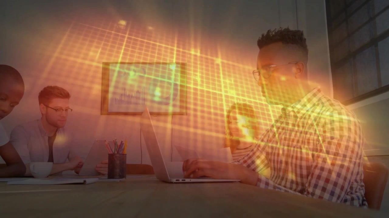 Man gesturing toward screen, guiding business team analyzing data with overlay highlighting chart