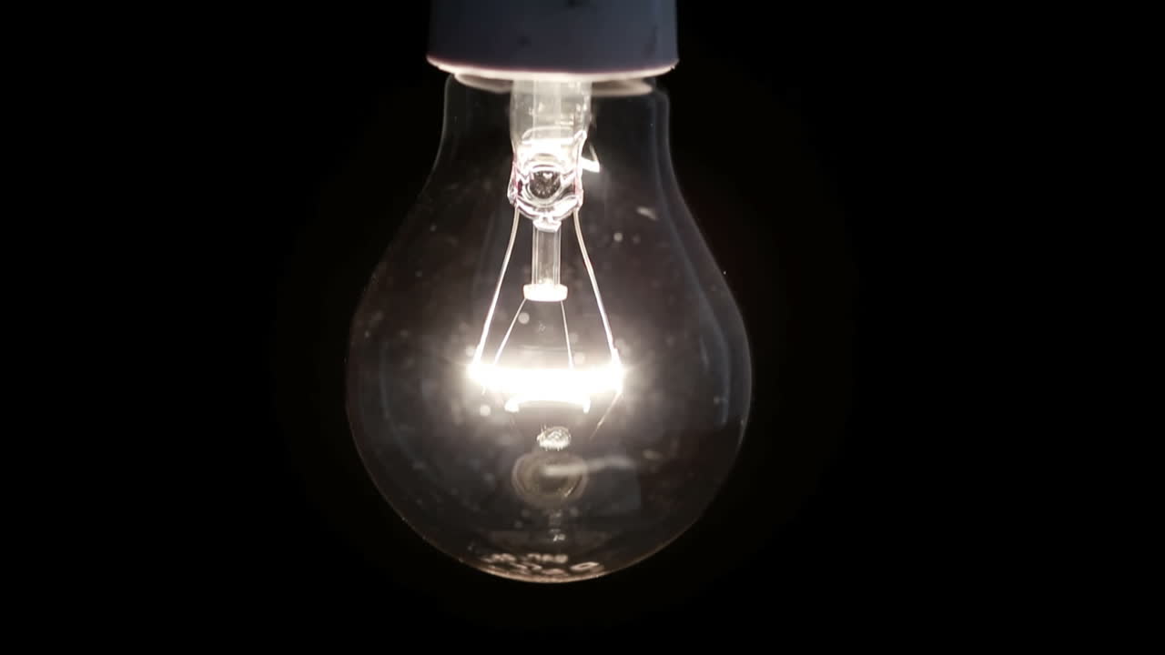 Enfoque en bombilla de filamento encendida