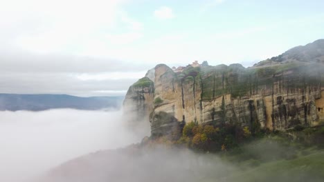 4k monestary of varlaam meteora greece, magical ancient building floating in the fog, fall colors, ancient greece, wonder of the world, tourist destination, natures beauty, breathtaking timelapse