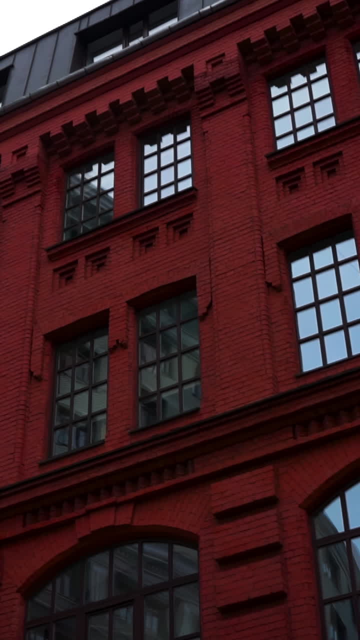 Red Brick Building Facade with Windows