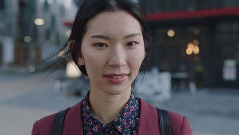 portrait of young asian student smiling in city close up of successful intern