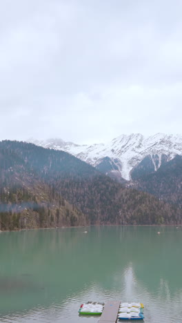 mountain lake scenery with snow-capped peaks