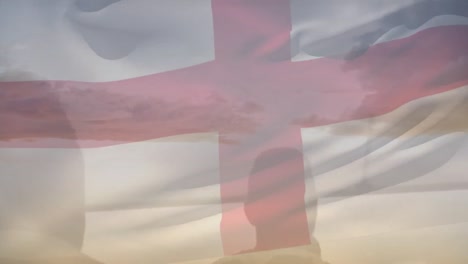 animation of flag of england over landscape