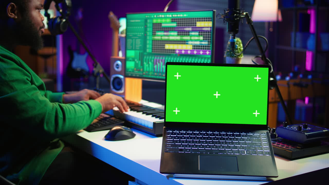 Professional artist operating on daw software in home studio
