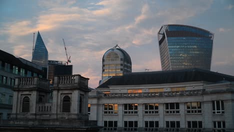 sunset over the city of london, united kingdom
