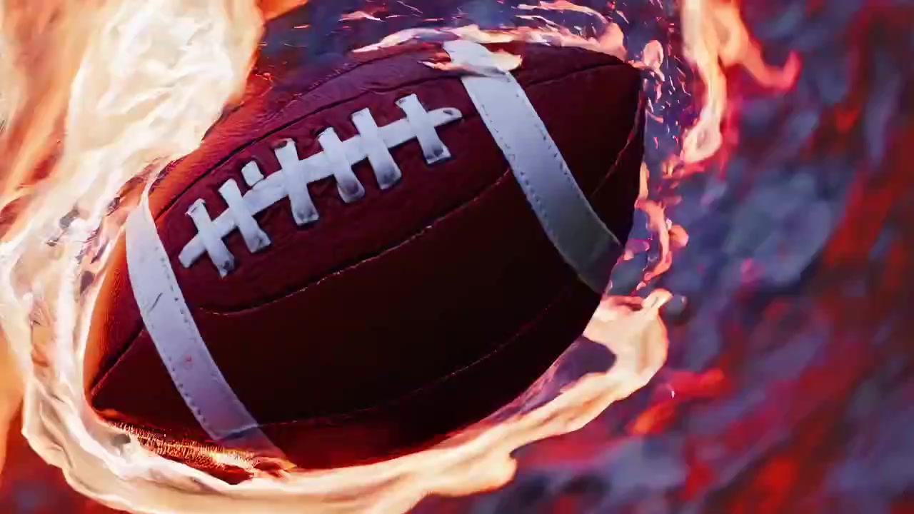 Pallone da football americano che ruota circondato da fiamme intense