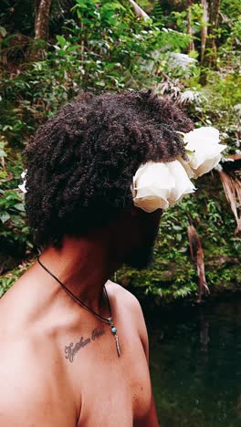 man with rose crown in jungle