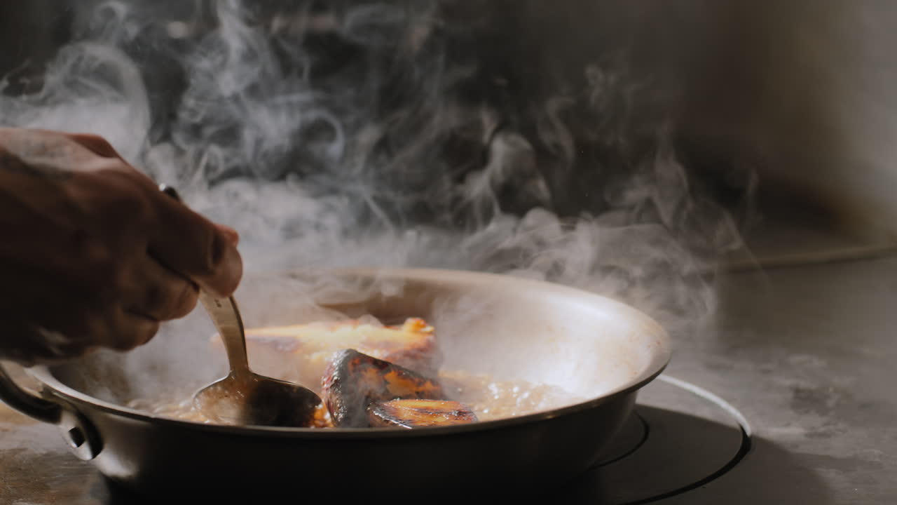 Saut&eacute;ing sweet potatoes in a sweet brown sauce in slow motion