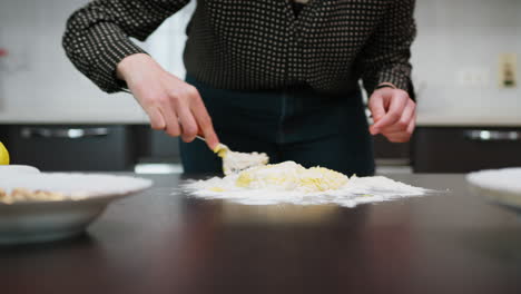 pastry chef mixes ingredients for typical italian easter cake