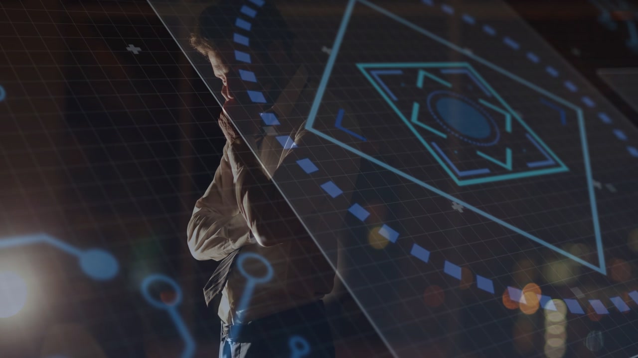 Man standing arms folded while holo HUD animating across torso showing business data for review