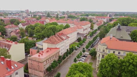 historical residential buildings in klaipeda, lithuania, aerial drone shot