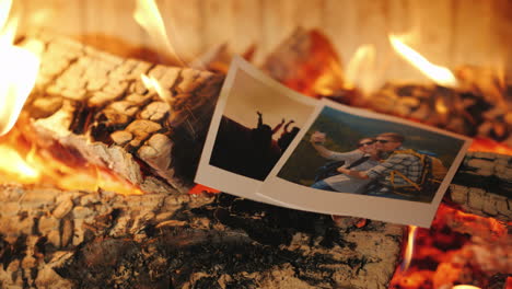 Family-Vacation-Photos-Burning-In-A-Fireplace