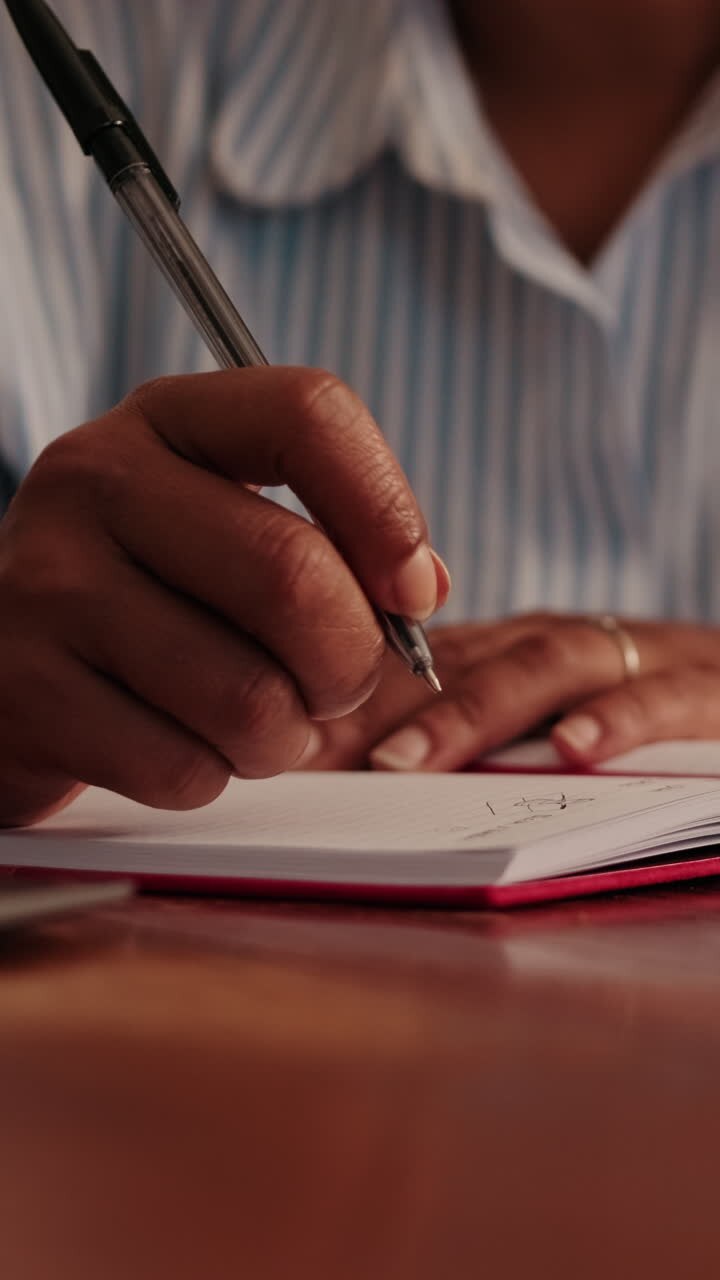 Woman Writing Notes with Chess Set