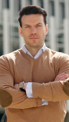 portrait of a man with arms crossed