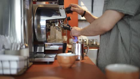 barista making coffee