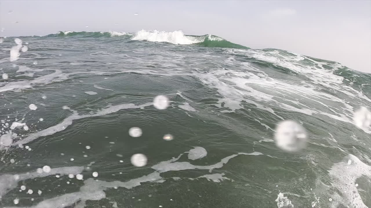 View of the waves and bubbles of the sea